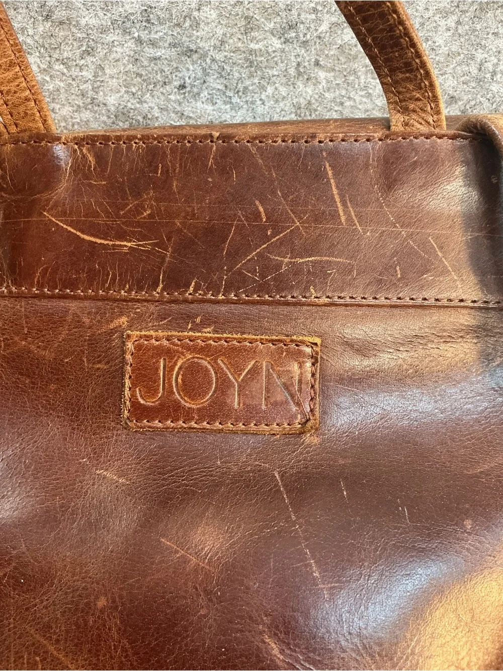 Joyn Brown Leather Backpack With Floral Lining